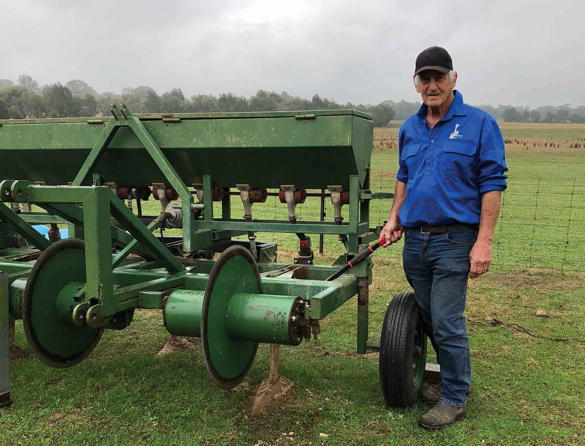 Ken Heywood from Warrenbayne, near Violet Town, demonstrating the soil aeration slipper underneath the aeration plough. 