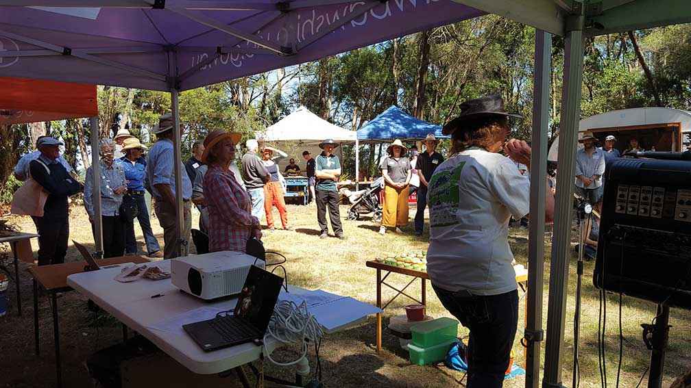 Weed buster Carolyn Ferguson inspiring the crowd at a Springsure Hill Landcare Group community engagement day.