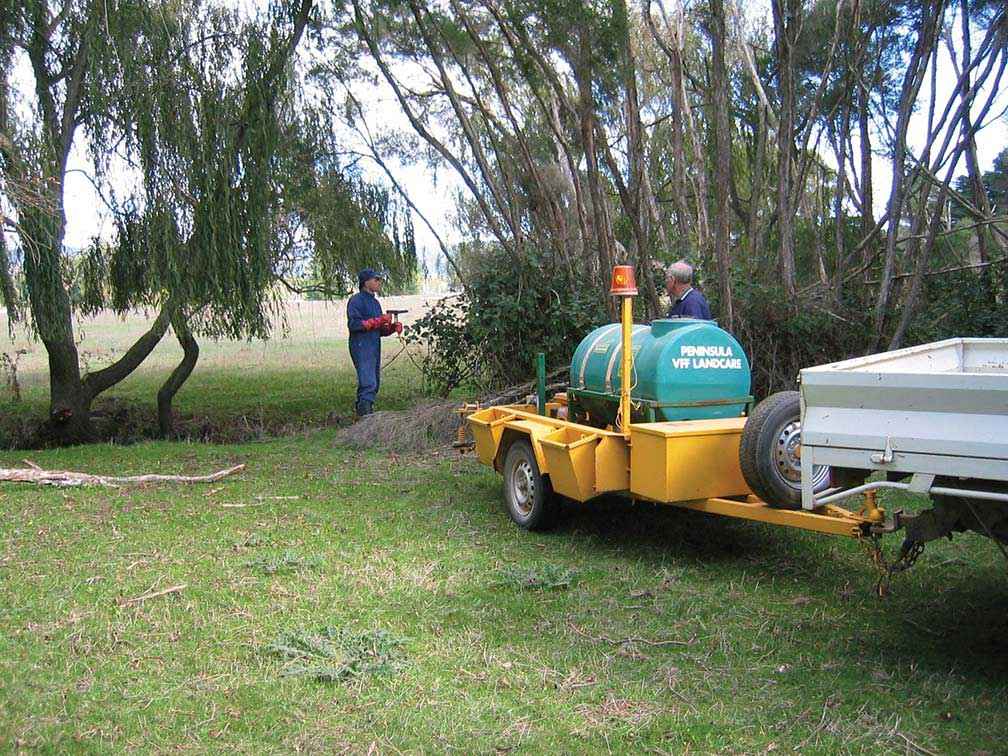 Dave Gibb spraying blackberries on Dunns Creek prior to the removal of willows and fencing of the creek.